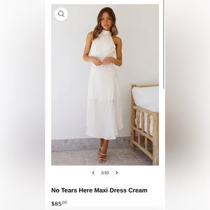 Cream colored high tie neck dress